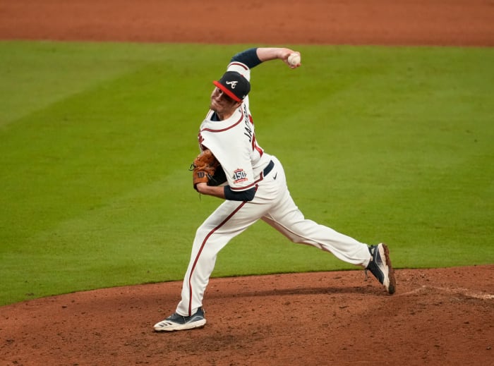 Atlanta Braves relief pitcher Luke Jackson (77) throws against the Houston Astros during the eighth inning of game four of the 2021 World Series.